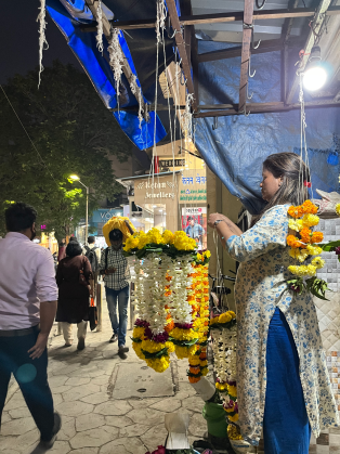 Woman selling flower garlands